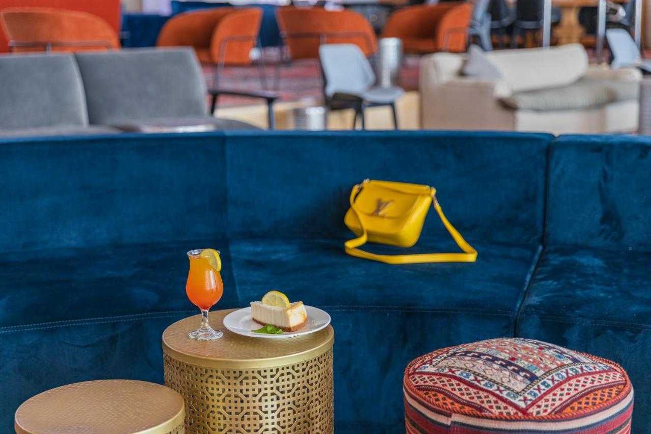 Enjoy Dead Sea Hotel Эйн-Бокек Экстерьер фото The lounge at the airport